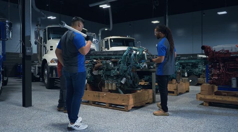 J-Tech students working on a truck engine in the Diesel Technology lab.