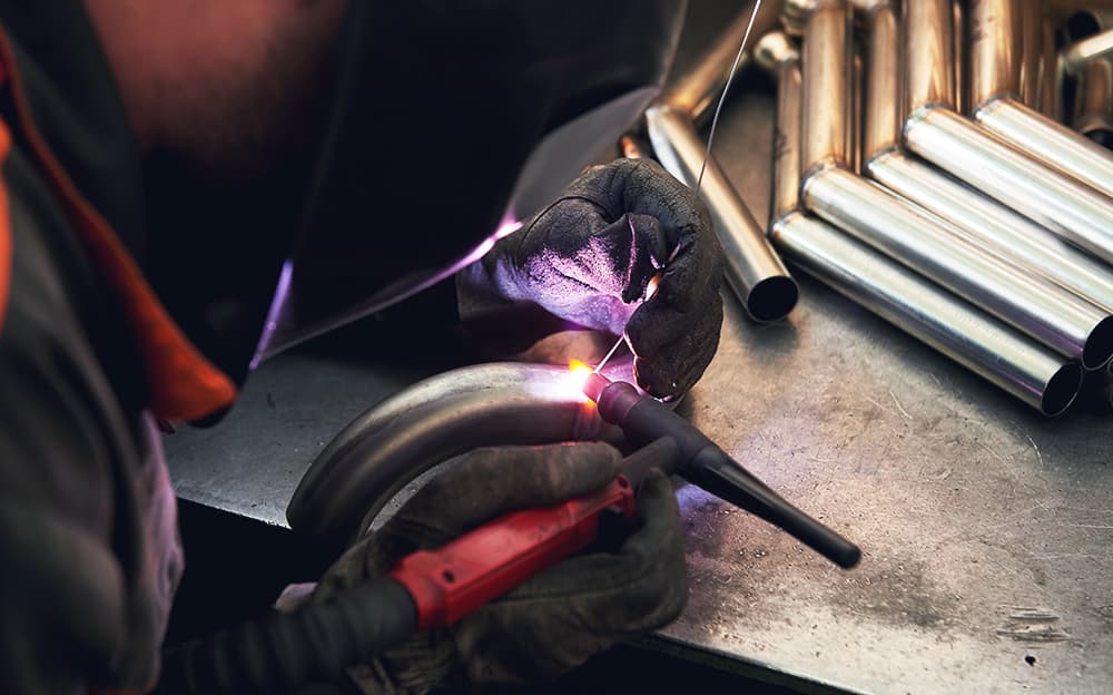 Close-up of a pipe welder