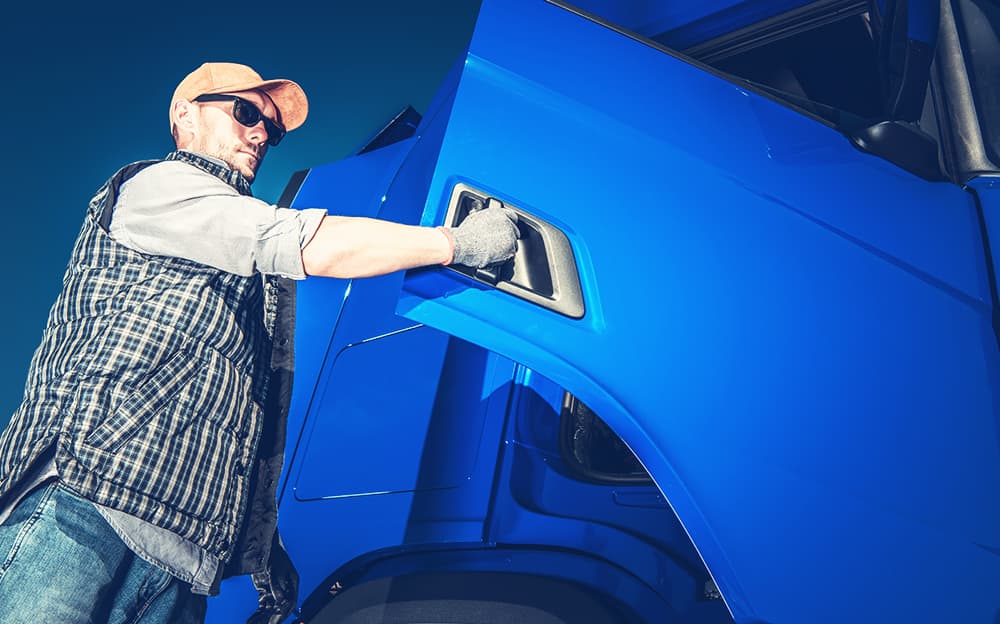 A man getting into his truck