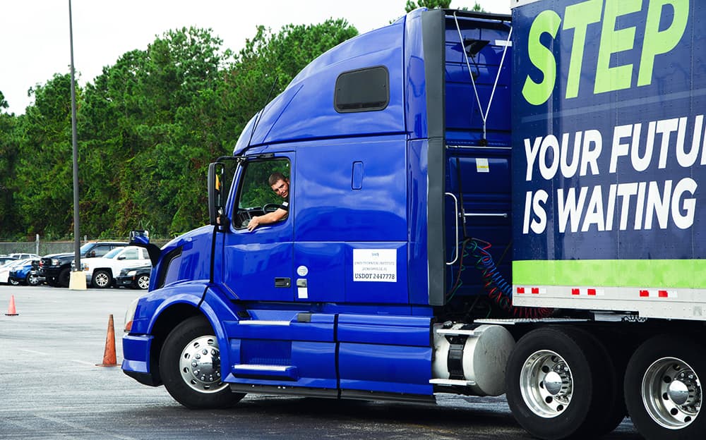 J-Tech Commercial Truck Driving student backing the testing truck into a space.