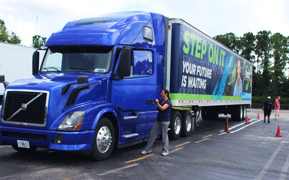 J-Tech Commercial Truck Driving student getting into the testing truck to take the CDL test.