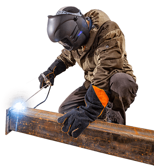 A welder working on an I beam for construction.