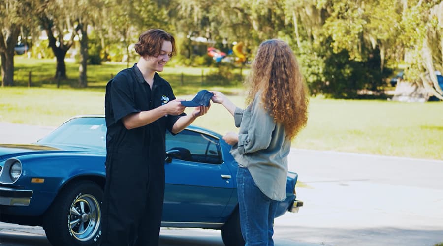 Mother sending her son off to J-Tech to become an Automotive Technician.