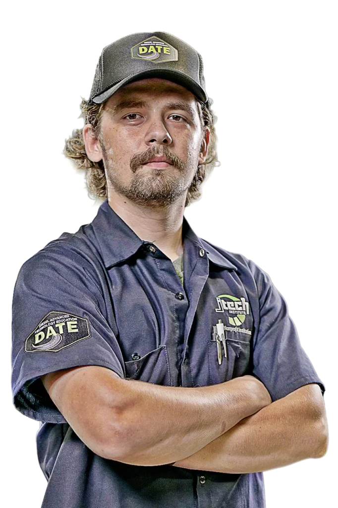 J-Tech D.A.T.E. Student standing with arms crossed